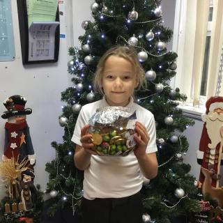 Christmas Fayre 2024: James won our ‘How Many Sweets in the Jar’ challenge. There were 162 sweets and James had the closest guess with 169. Well done!